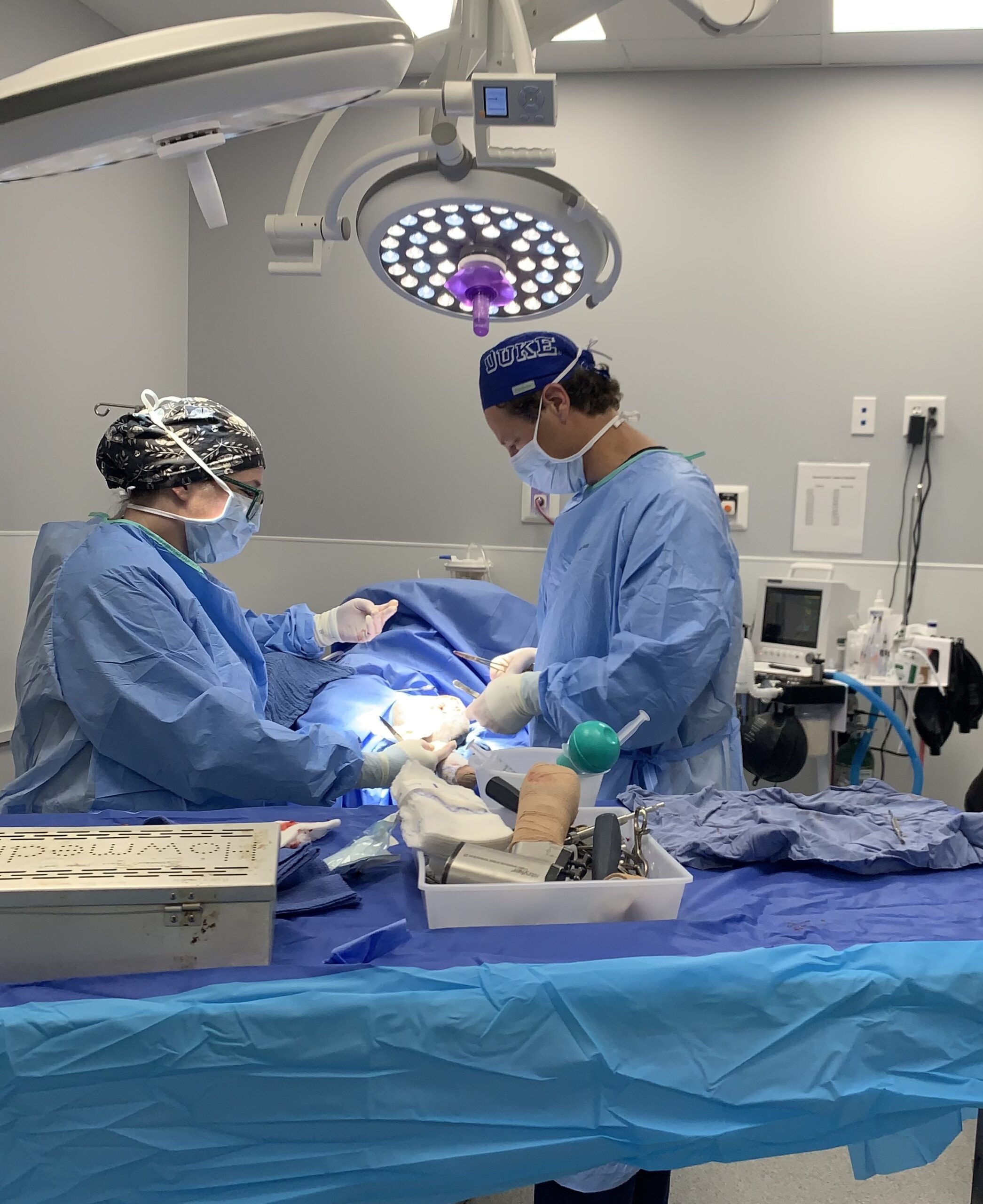 Dr. Nunley and Bailey in Surgery